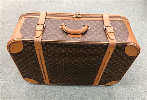 louis vuitton large suitcase.